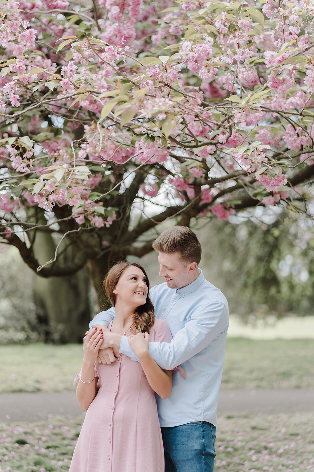 London Greenwich park pink cherry blossom engagement couples shoot London Greenwich park pink cherry blossom engagement couples shoot