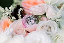 Beautiful wedding ring in bouquet of flowers