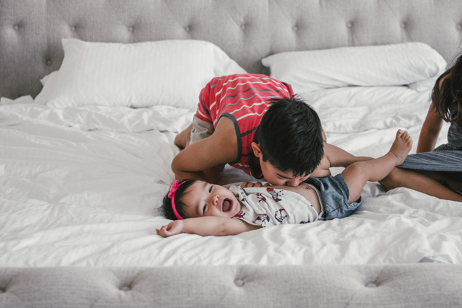 big brother playing with little sister