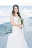 Happy bride by the sea