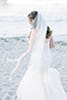 Elegant bride on the beach in natural light