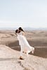 agafay desert elopement in marrakech morocco with grace loves lace dress by Chloe Ely Photography