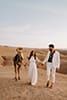 agafay desert elopement in marrakech morocco with grace loves lace dress by Chloe Ely Photography