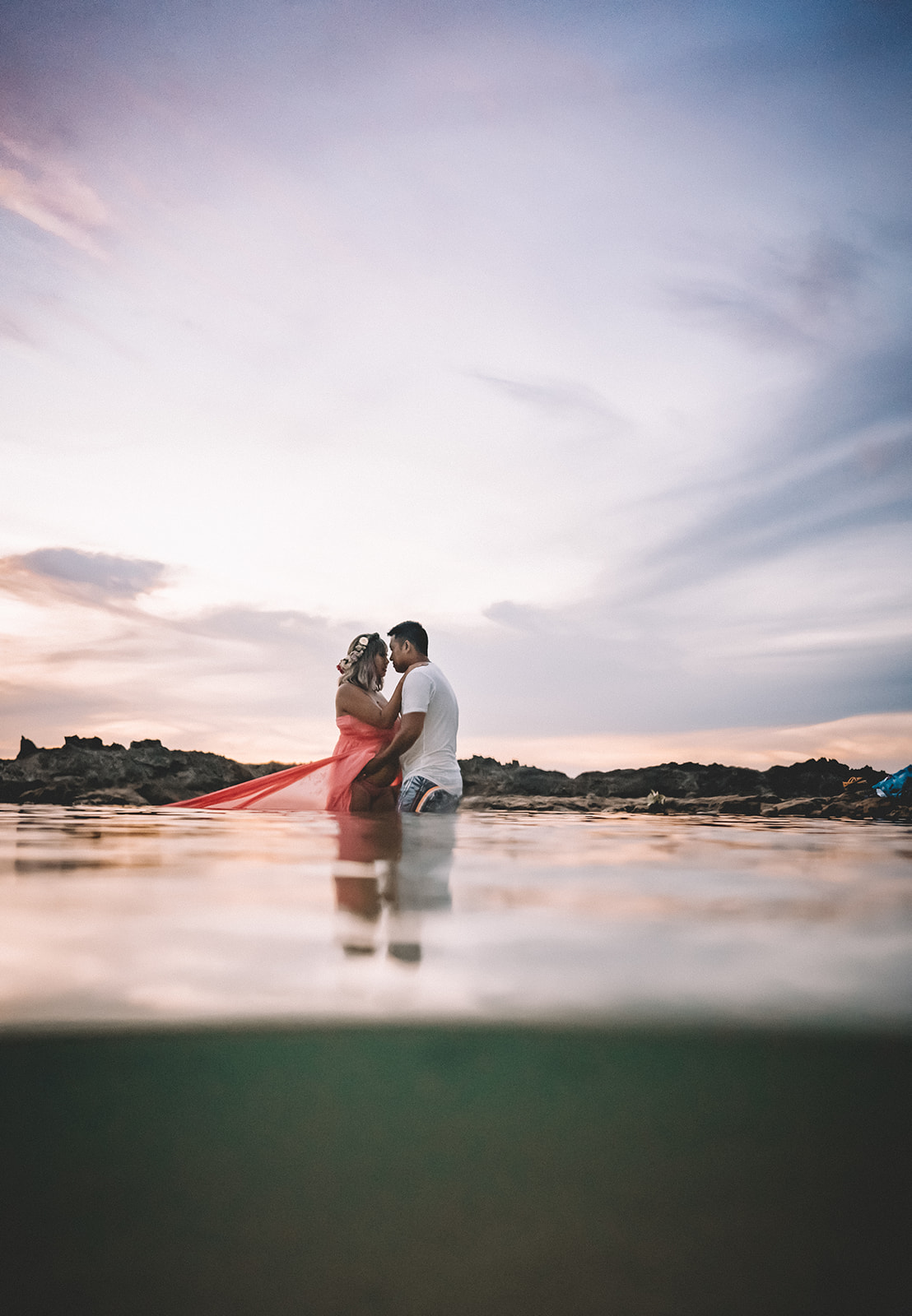 Babymoon photos in Hawaii Underwater Maternity Photos at Sharks Cove on Oahu