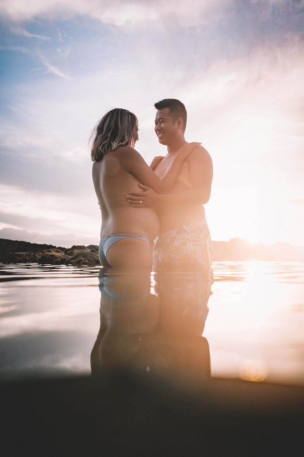 Babymoon photos in Hawaii Underwater Maternity Photos at Sharks Cove on Oahu