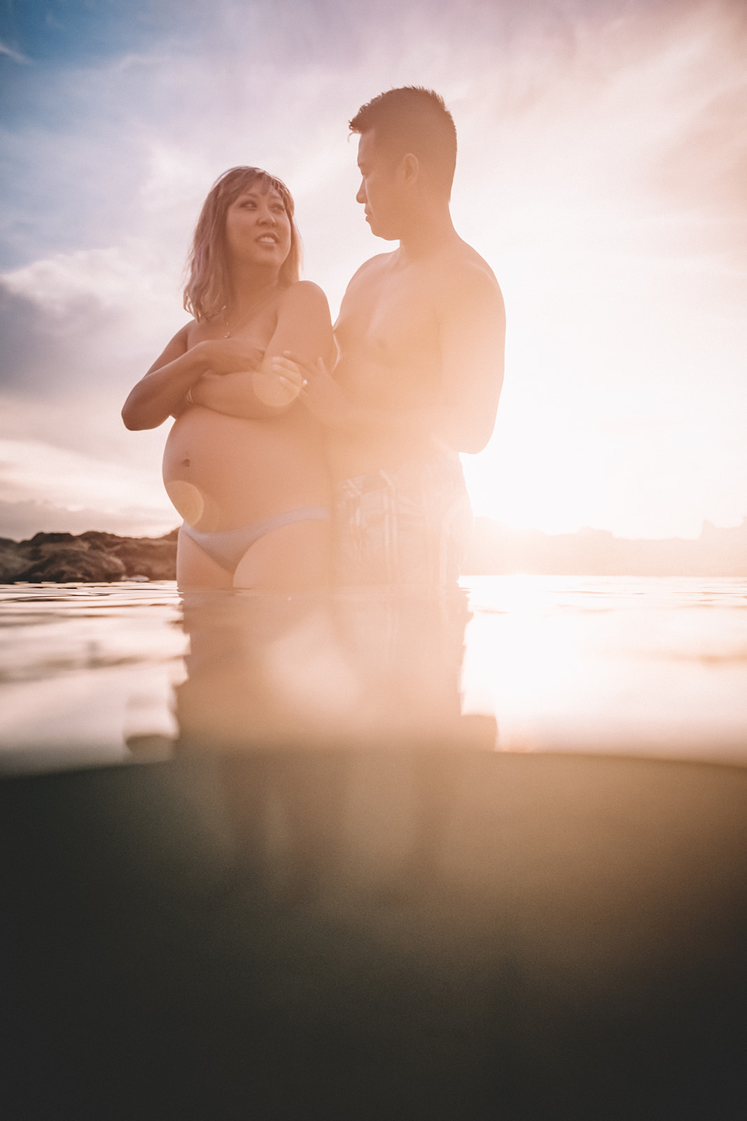 Babymoon photos in Hawaii Underwater Maternity Photos at Sharks Cove on Oahu