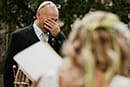 Groom crying during a wedding