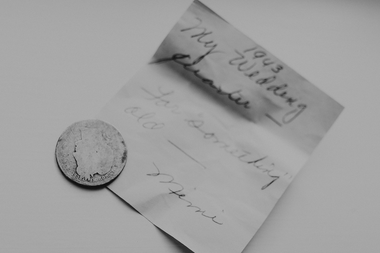 family heirloom coin with old note saying