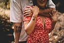 Couple with tattoos take couples photos in Hawaii