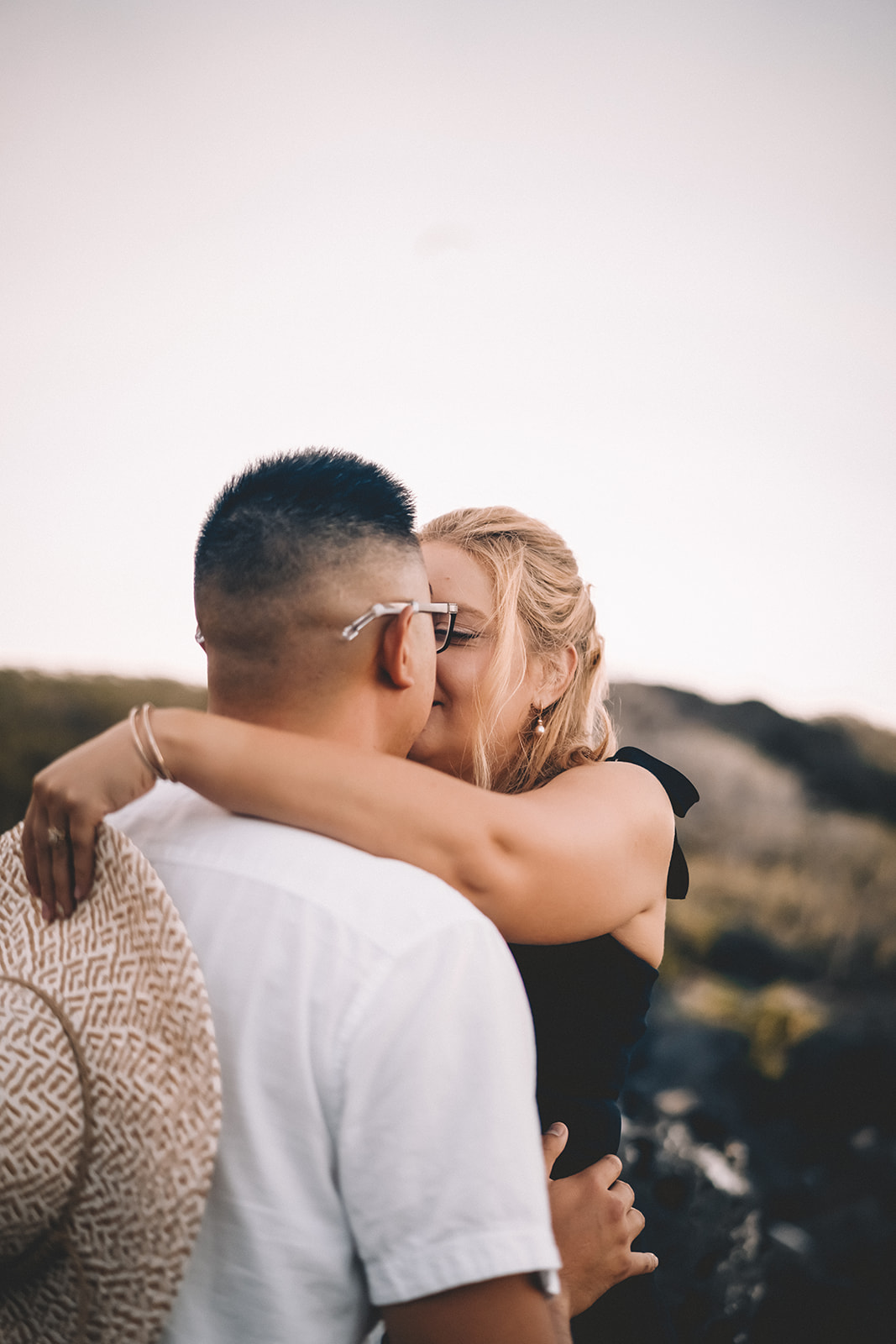 Couple kissing makapuu beach hawaii