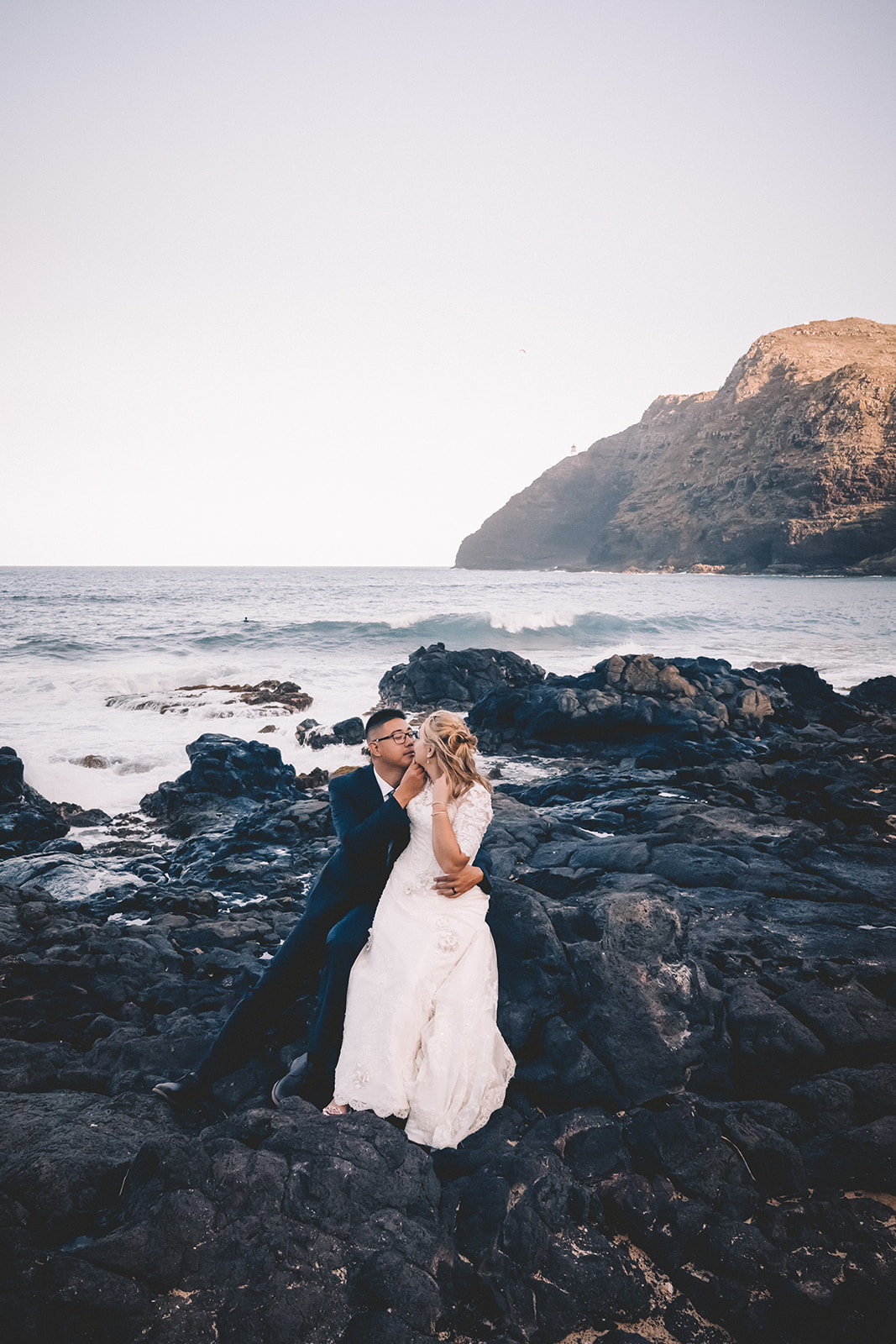 Couple kissing on Hawaii beach makapuu