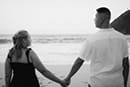 black and white photo couple holding hands makapuu beach