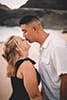 man kissing woman on nose smiling makapuu beach